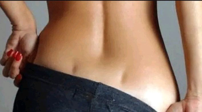 What Lower Back Dimple Means & When To Worry About It